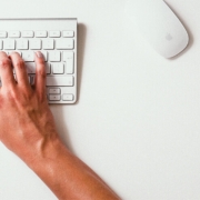 Person using keyboard and mouse